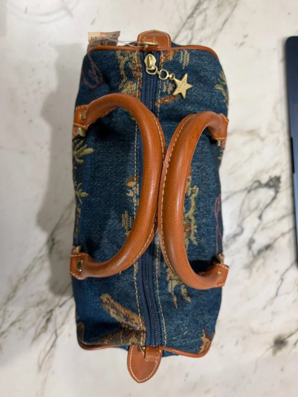 Denim and leather handbag with Southwestern Design